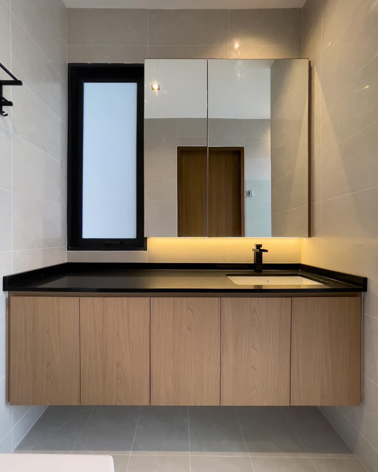 Eco Sanctuary condominium renovation at Chestnut Avenue with bespoke fluted wood cabinetry